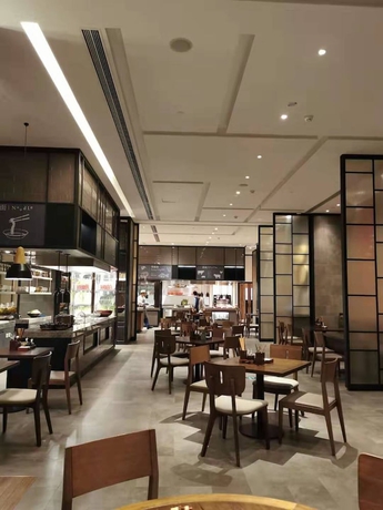 Imagen del bar/restaurante del Hotel KHOS Langfang. Foto 4