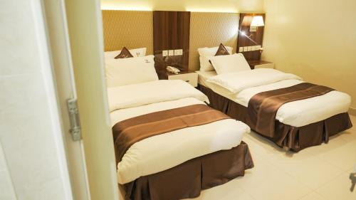 Imagen de la habitación del Hotel KIGALI DELIGHT HOTEL &APARTMENTS. Foto 19
