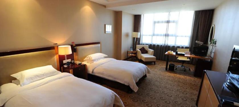 Imagen de la habitación del Hotel KING LION INTERNATIONAL HOTEL. Foto 10