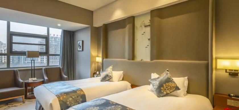 Imagen de la habitación del Hotel KING LION INTERNATIONAL HOTEL. Foto 11