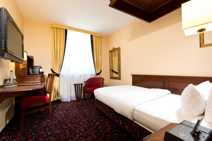 Imagen de la habitación del Hotel KING's First. Foto 7