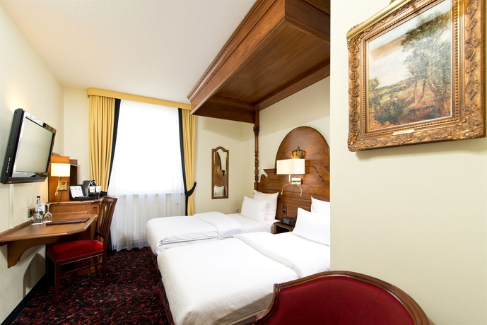 Imagen de la habitación del Hotel KING's First. Foto 8