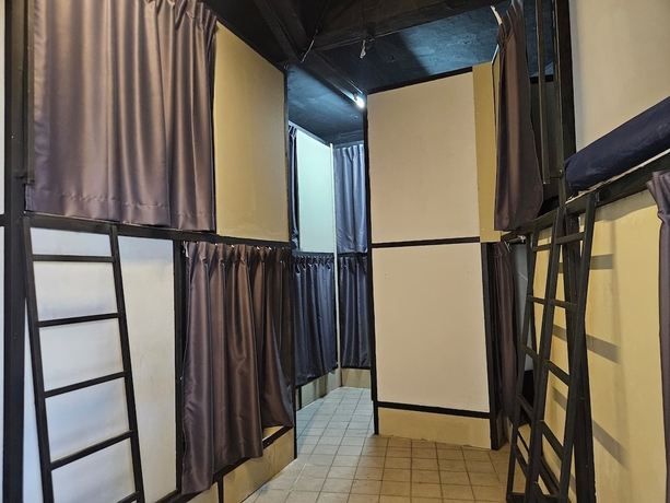 Imagen de la habitación del Hotel KITA Hostel. Foto 10