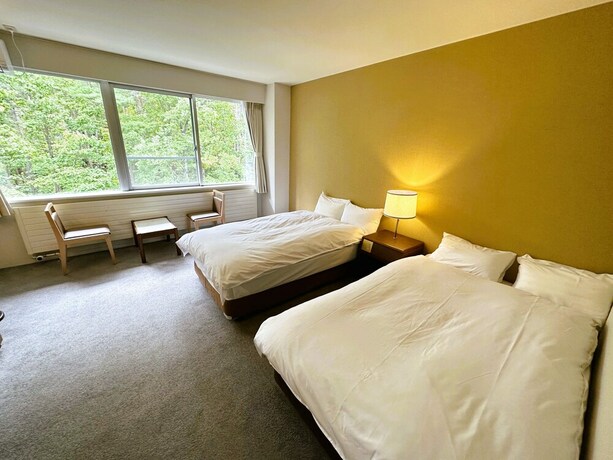 Imagen de la habitación del Hotel KITAKARUIZAWA Golden Forest. Foto 19
