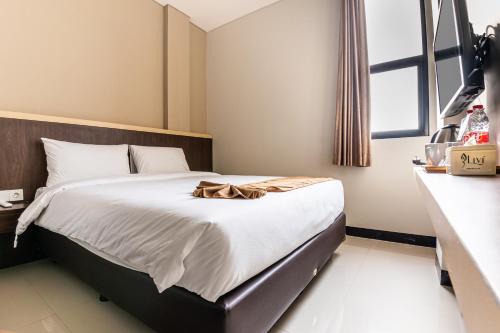 Imagen de la habitación del Hotel KIYANA HOTEL SEMARANG. Foto 16