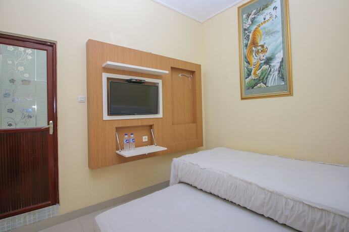 Imagen de la habitación del Hotel KJA Guest House. Foto 12