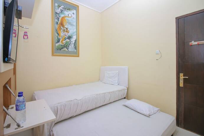 Imagen de la habitación del Hotel KJA Guest House. Foto 14