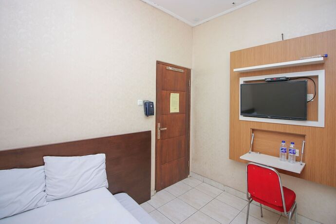 Imagen de la habitación del Hotel KJA Guest House. Foto 19