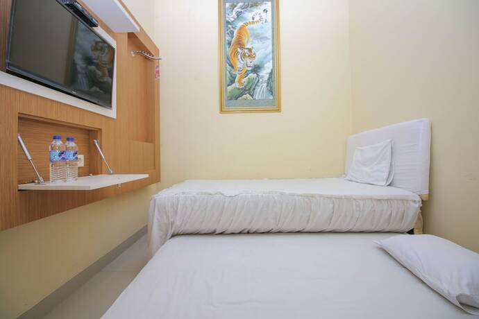 Imagen de la habitación del Hotel KJA Guest House. Foto 20