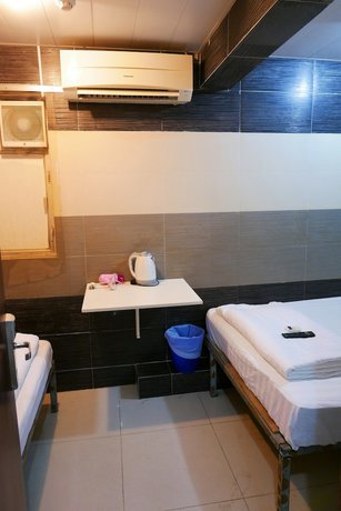 Imagen de la habitación del Hotel KK, Kowloon. Foto 17