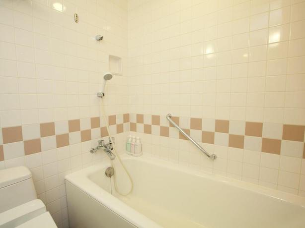 Imagen de la habitación del Hotel KKR Hotel Umeda. Foto 17
