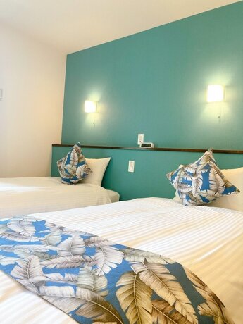 Imagen de la habitación del Hotel KOHALA HOTEL. Foto 8