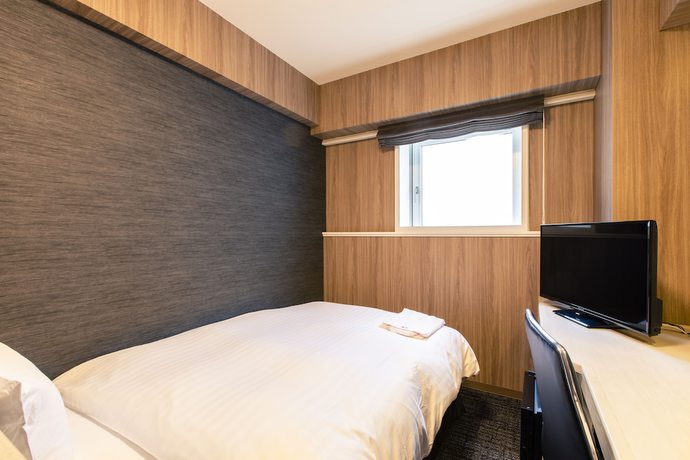 Imagen de la habitación del Hotel KOKO HOTEL Asahikawa Station. Foto 12