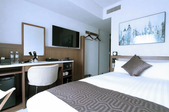 Imagen de la habitación del Hotel KOKO HOTEL Ginza 1chome. Foto 10