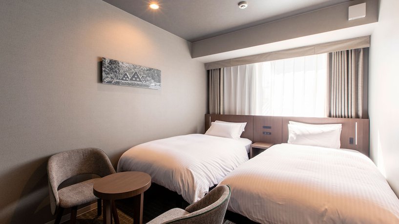 Imagen de la habitación del Hotel KOKO HOTEL Hidatakayama. Foto 11