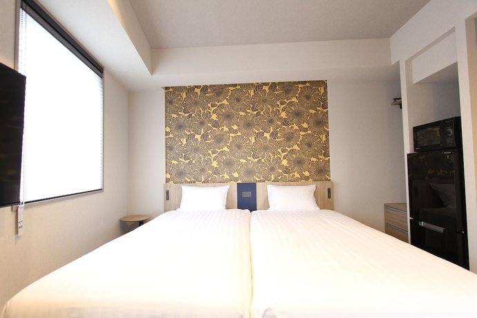 Imagen de la habitación del Hotel KOKO HOTEL Residence Asakusa Tawaramachi. Foto 6