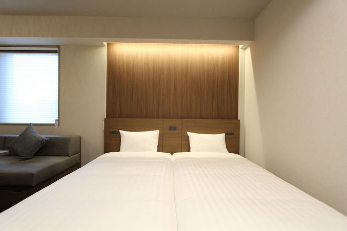Imagen de la habitación del Hotel KOKO HOTEL Residence Asakusa Tawaramachi. Foto 8