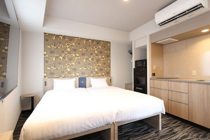 Imagen de la habitación del Hotel KOKO HOTEL Residence Asakusa Tawaramachi. Foto 12