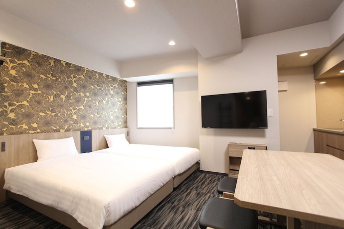 Imagen de la habitación del Hotel KOKO HOTEL Residence Asakusa Tawaramachi. Foto 18