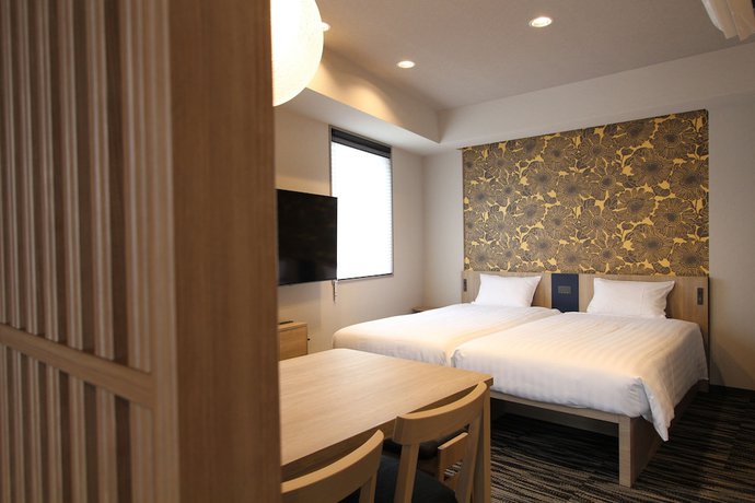Imagen de la habitación del Hotel KOKO HOTEL Residence Asakusa Tawaramachi. Foto 19