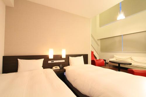 Imagen de la habitación del Hotel KOKO HOTEL Sendai Kotodai Park. Foto 16