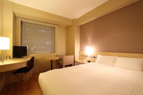 Imagen de la habitación del Hotel KOKO HOTEL Sendai Kotodai Park. Foto 18