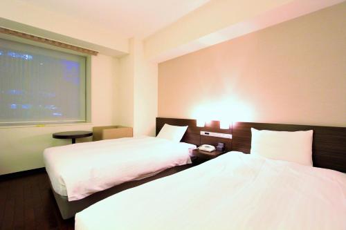 Imagen de la habitación del Hotel KOKO HOTEL Sendai Kotodai Park. Foto 20