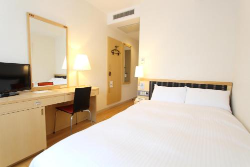 Imagen de la habitación del Hotel KOKO HOTEL Sendai Station West. Foto 12