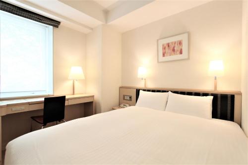 Imagen de la habitación del Hotel KOKO HOTEL Sendai Station West. Foto 13