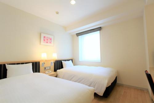 Imagen de la habitación del Hotel KOKO HOTEL Sendai Station West. Foto 14