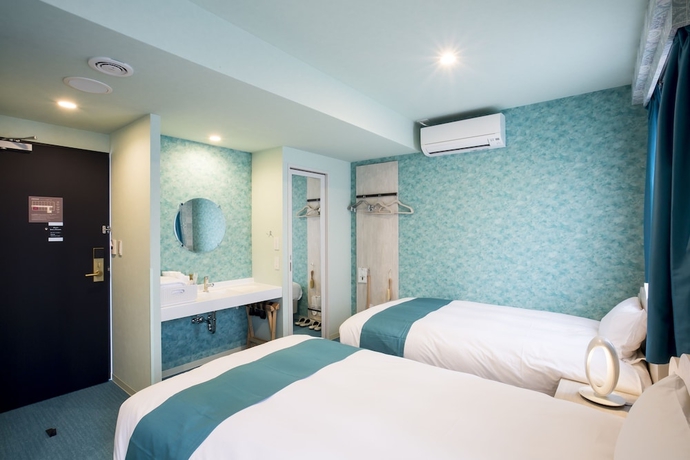 Imagen de la habitación del Hotel KOKO Hakata Station. Foto 3
