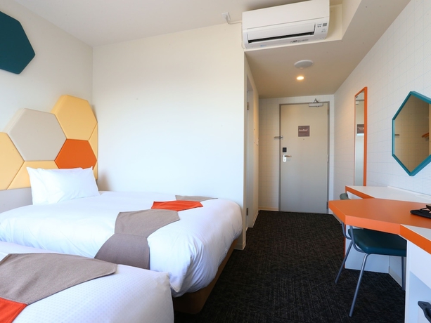 Imagen de la habitación del Hotel KOKO Higashiosaka. Foto 7