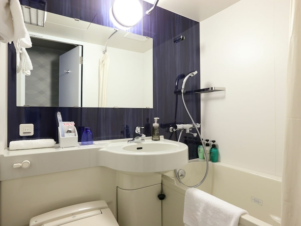 Imagen de la habitación del Hotel KOKO Higashiosaka. Foto 9