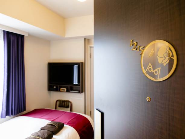 Imagen de la habitación del Hotel KOKO Ikebukuro. Foto 9