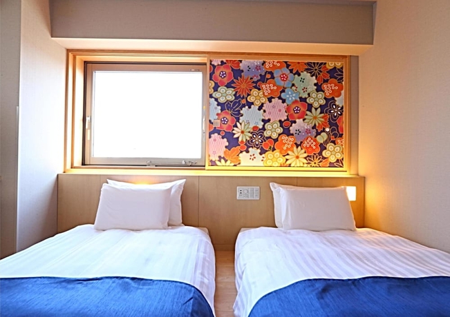 Imagen de la habitación del Hotel KOKO Kanazawa Station. Foto 2