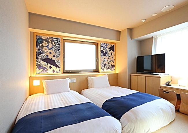 Imagen de la habitación del Hotel KOKO Kanazawa Station. Foto 3