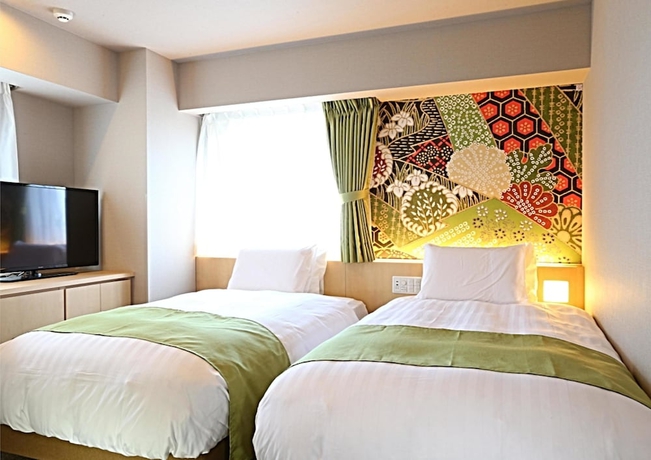 Imagen de la habitación del Hotel KOKO Kanazawa Station. Foto 6