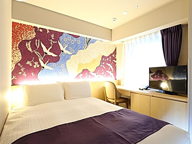 Imagen de la habitación del Hotel KOKO Kanazawa Station. Foto 8