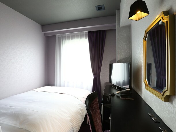 Imagen de la habitación del Hotel KOKO Osaka Umeda. Foto 22