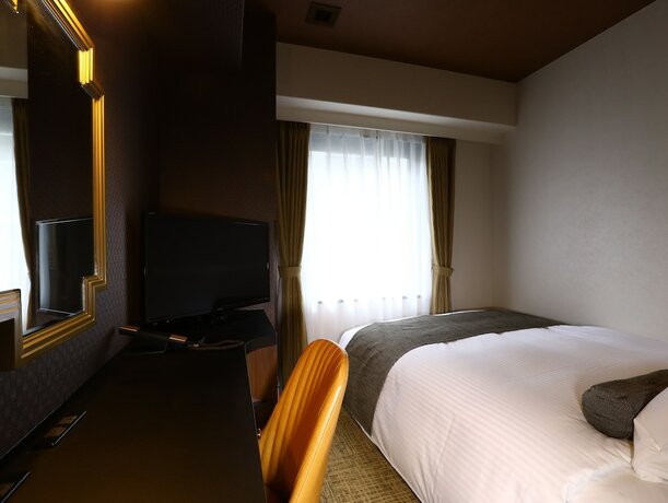 Imagen de la habitación del Hotel KOKO Osaka Umeda. Foto 23