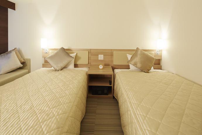 Imagen de la habitación del Hotel KOKO Sapporo Ekimae. Foto 10