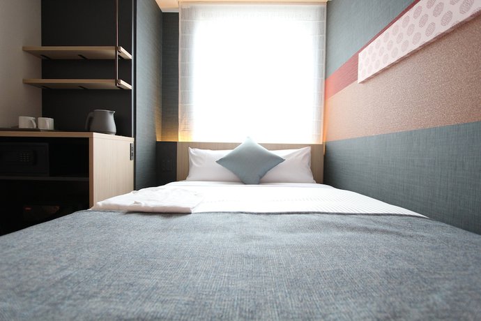 Imagen de la habitación del Hotel KOKO Tsukiji Ginza. Foto 6