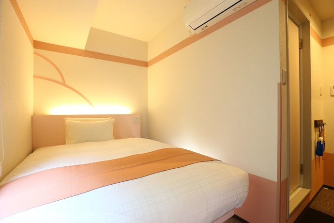 Imagen de la habitación del Hotel KOKO Ueno Station. Foto 13