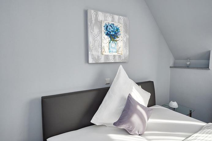 Imagen de la habitación del Hotel KOMM\' IN. Foto 7