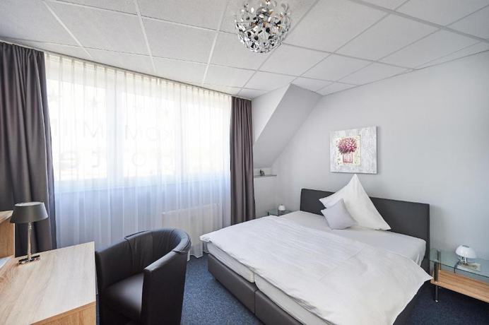 Imagen de la habitación del Hotel KOMM\' IN. Foto 8