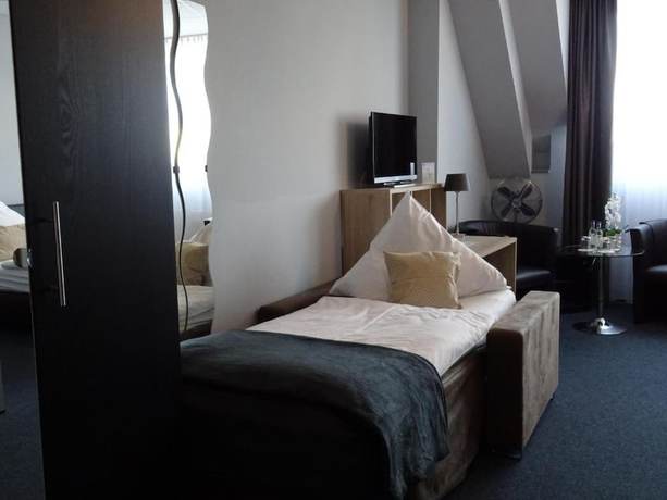 Imagen de la habitación del Hotel KOMM\' IN. Foto 9