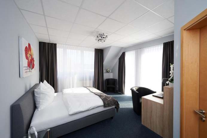 Imagen de la habitación del Hotel KOMM\' IN. Foto 11