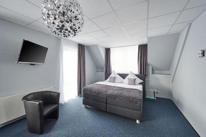 Imagen de la habitación del Hotel KOMM\' IN. Foto 12