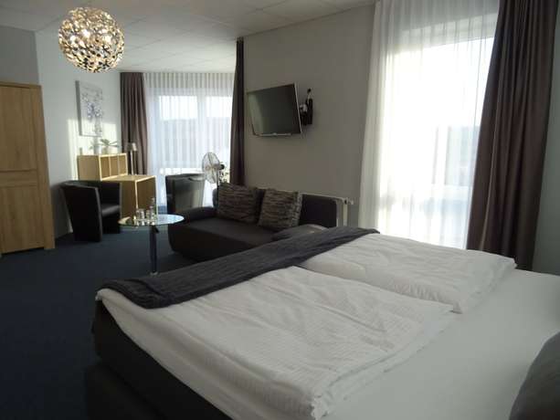 Imagen de la habitación del Hotel KOMM\' IN. Foto 16