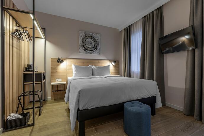 Imagen de la habitación del Hotel KONTRAKT Boutique. Foto 11